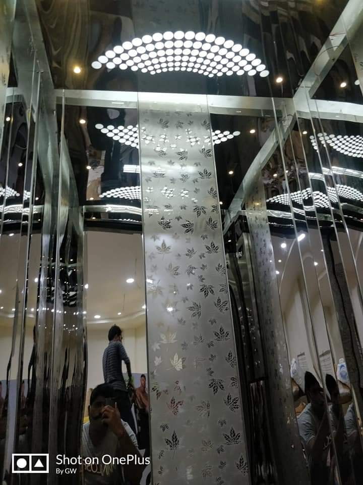 Modern elevator interior with LED ceiling lights
